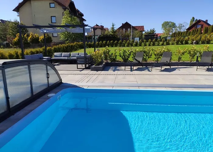 Letniskowe Blekit Деревянный коттедж *